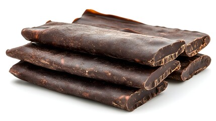 A stack of four dark chocolate bars rests on a pristine white background showcasing rich, decadent texture and intense color.