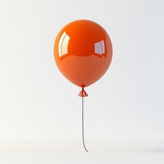 Obraz premium An orange balloon with a string floats against a plain background.