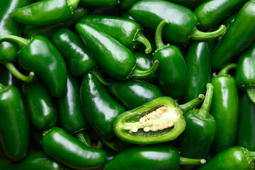 Top view of green mexican jalapeno hot peppers close up. Food photography