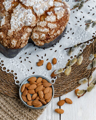 Colomba - Italian traditional Easter bread is topped with pearl sugar and almonds in the shape of a dove. Festive pastries are traditional in Italy.