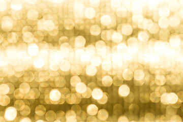 Obraz premium Abstract blurred yellow light bokeh background, festive season concept background, yellow bokeh pattern background