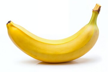 A perfectly ripe banana, a vibrant yellow curve against a stark white background, showcasing its smooth skin and healthy glow.