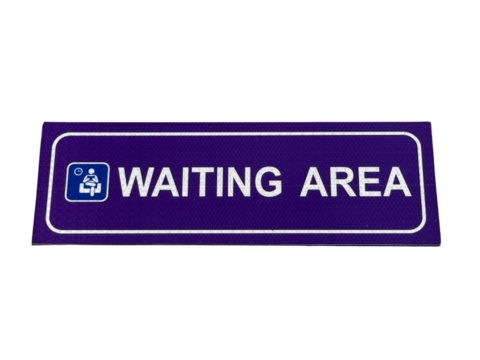 Purple rectangular sign indicating a waiting area with a pictogram of a seated person.