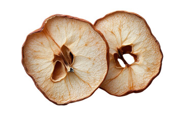 Two glistening dried apple slices hinting at simple pleasures and healthy snacks detailed texture against a stark black backdrop sharp focus.