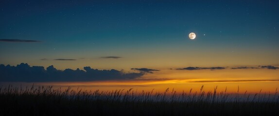 A young moon in the clouds, during sunset.