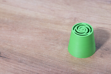 Pastry tip for making marshmallow flowers. Marshmallow tip for pastry bag. Made of plastic. Green in color.