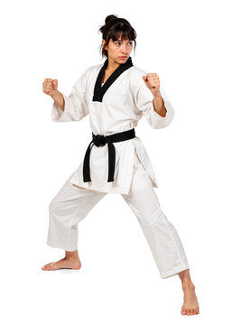 Female Taekwondo athlete in defensive stance ready to fight