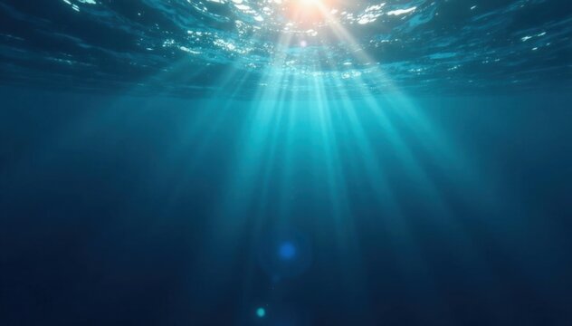 Mysterious dark blue ocean surface reflecting sunlight from beneath the surface, light, ocean