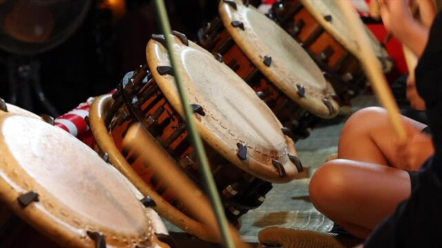 Playing_drums_at_a_festival