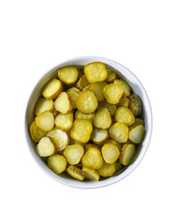 chopped pickled cucumbers in a white bowl isolated on a white background, top view.