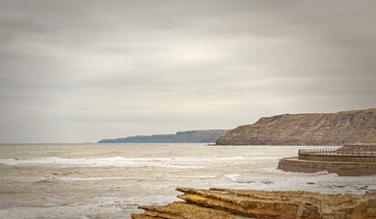 Seascape with cliffs.
