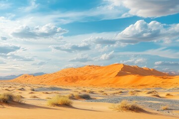 Fototapeta premium Expansive desert landscape showcasing vibrant orange dunes under a vast blue sky
