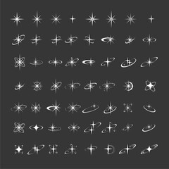 Collection of Various Star and Sparkle Icons and Symbols on Dark Background