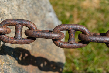 Photo of chain on stone
