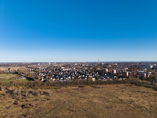 A Beautiful Aerial View of a Vast Urban Landscape Under a Clear and Bright Blue Sky Hannover Langenhagen