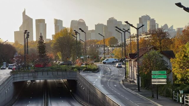Urban Highway Leading to La D&eacute;fense Skyline at Sunrise in Paris Suburbs