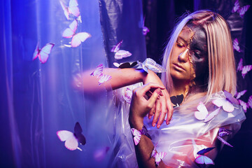 An Artistic Portrait Featuring Beautiful Butterflies and Distinctive, Unique Makeup Designs