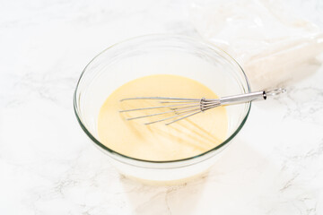 Whisking Delight - Bundt Cake Batter Preparation Begins