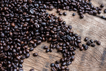Arabica roast coffee bean spread on wood table