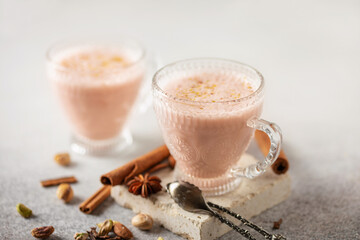 Pink Tea Kashmiri Chai. Traditional Kashmiri tea with  sliced pistachios, almonds. Pakistani cuisine
