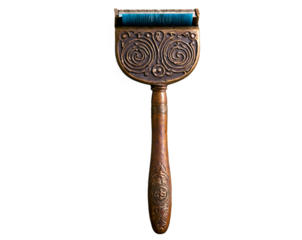 An ornate, rustic bronze razor featuring intricate swirling designs, potentially used for ceremonial shaving, with a striking combination of classic artistry and antiquated aesthetic qualities