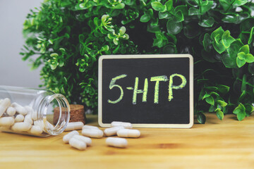 5-HTP sleep supplement capsules. Selective Focus.