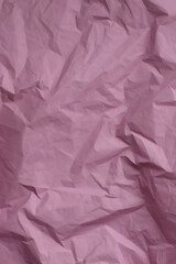 Textured crinkled purple or hot pink paper for background