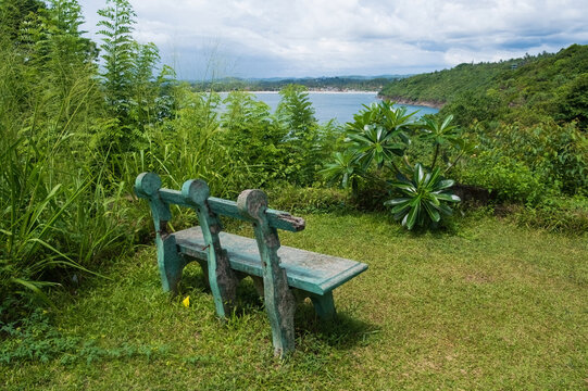 Viewpoint with bench overlooking the ocean or sea in Sri Lanka in Rumassala Reserve, near Unawatuna village.