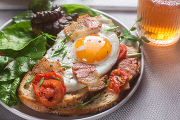 Breakfast. Scrambled eggs with toast and lettuce