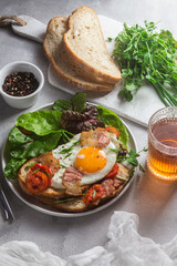 Breakfast. Scrambled eggs with toast and lettuce