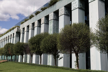 Fototapeta premium Modern facade of the Supreme Court of Poland in Warsaw, a striking example of contemporary government architecture.