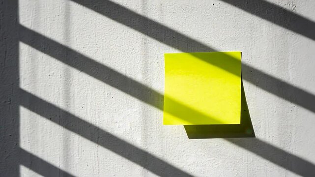 Yellow sticky note on the wall.