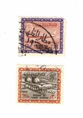 Vintage postage stamps from South Arabia on a white background.