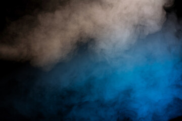 Blue and yellow steam on a black background.