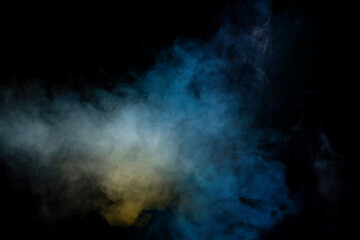 Blue and yellow steam on a black background.