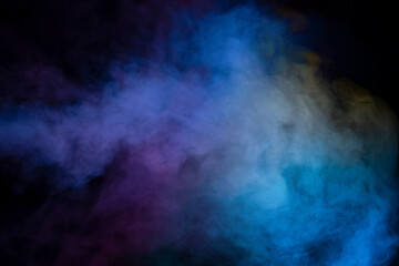 Blue and yellow steam on a black background.