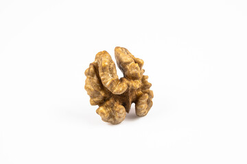 Walnut kernel close-up isolated on white background.