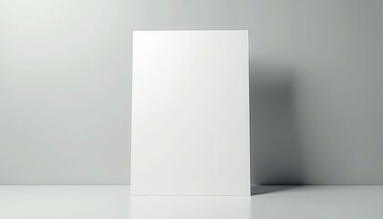 A blank white rectangular board stands upright against a light gray background. This clean, minimalist setup is perfect for showcasing creative designs, presentations, or content in a modern style