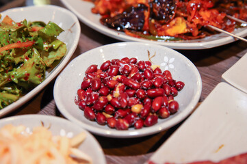 Chinese side dish food. Salted peanuts.
