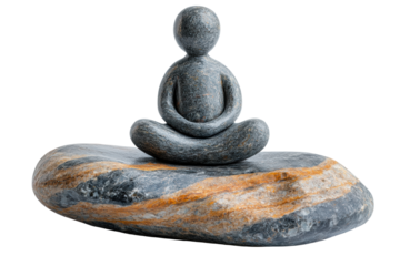 A serene stone sculpture of a meditating figure on a textured rock, symbolizing peace, balance, and mindfulness.