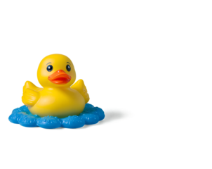 Cheerful Yellow Rubber Duck Toy on a Blue Floating Base, A Nostalgic Symbol of Bath Time Fun, Perfect for Childhood Memories and Playful Moments, Isolated on a Solid Backdrop