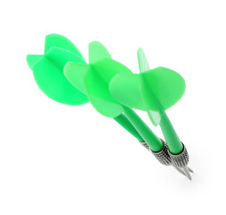 Green dart arrows in air isolated on white. Sports equipment