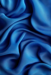 Obraz premium Blue Silk Fabric Flowing in Elegant Waves Creates a Luxurious Texture