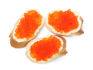 Tasty sandwiches with red caviar isolated on white, top view