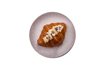 Sweet crispy fresh croissant with berry filling