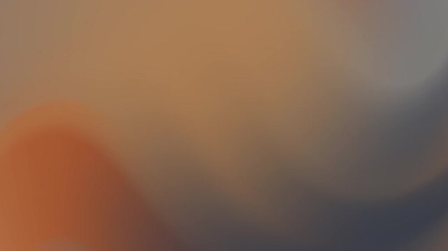 Blurry gradient of orange brown and grey background suitable for modern design projects, website headers, social media posts, and presentations.