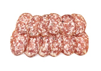 Slices of Felino salami on white background. It's a italian salume variety made of pure pork 
