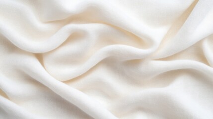 Obraz premium Smooth, flowing, creamy white fabric drapes in soft folds. A close-up view of the texture