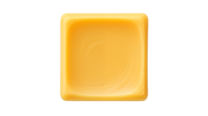 A single square of yellow caramel or butterscotch candy on a black background center shotisolated on transparent background