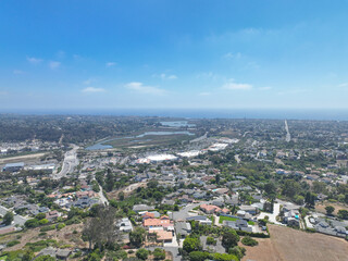 Fototapeta premium Aerial view of middle class houses in the valley of Oceanside town in San Diego, California. USA.